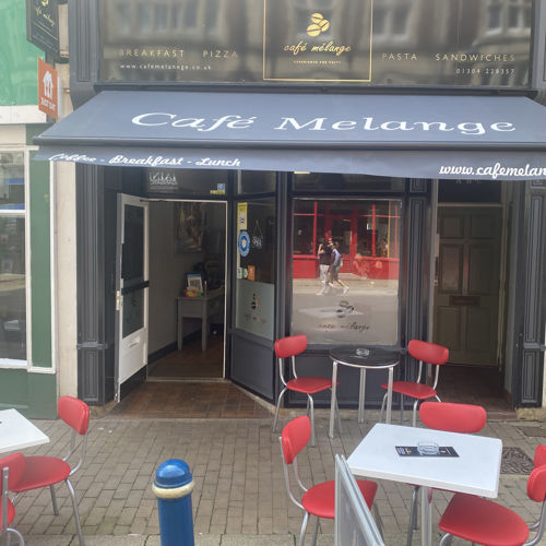 Tables and chairs outside Café Melange  