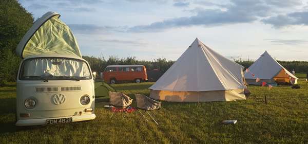 Camper van and bell tent, at Fallow Fields Camping