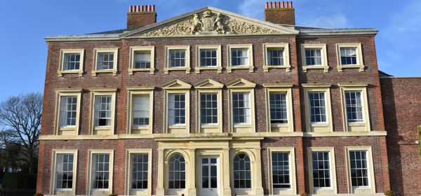 The frontage of a magnificent country house.