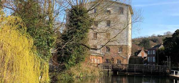 Crabble Corn Mill reflected in the River Dour
