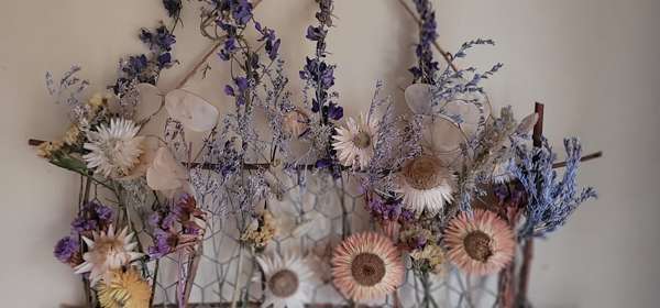 Dried flowers arranged on a frame