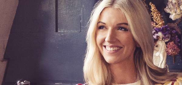 Photo of Harriet sitting in a chair