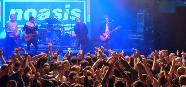 Photo of Noasis performing on stage
