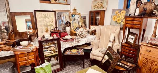 An arrangement of antique furniture and paintings for sale