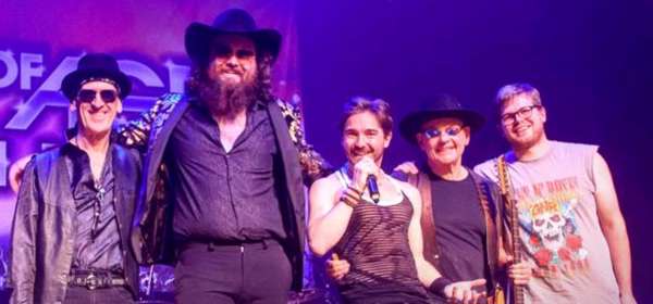 Photo of the 5 band members of The Rock of Ages