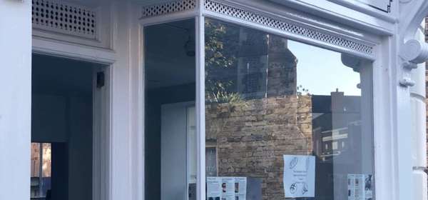 The shop window of The Sandwich Bakery Company displaying a selection of artisan breads