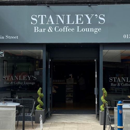 Exterior of Stanley's with outside seating