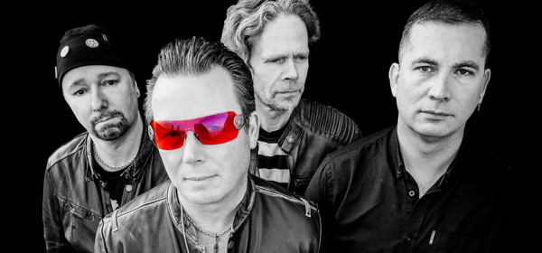 Photo of the 4 members of the band U2 Tribe